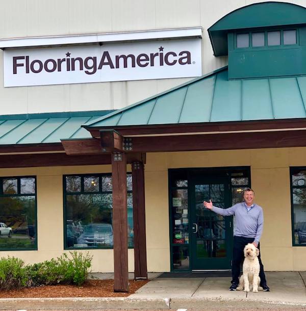 Flooring America in Williston, VT, showroom exterior with dog